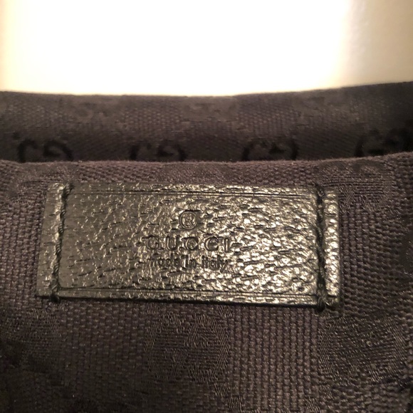 Gucci GG monogram duffle bag with signature straps